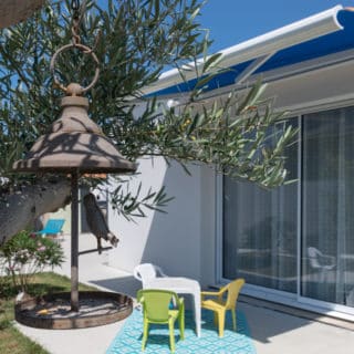 Maison neuve 81 m² à Vaux-sur-Mer – baie vitrée du séjour ouvrant sur la terrasse